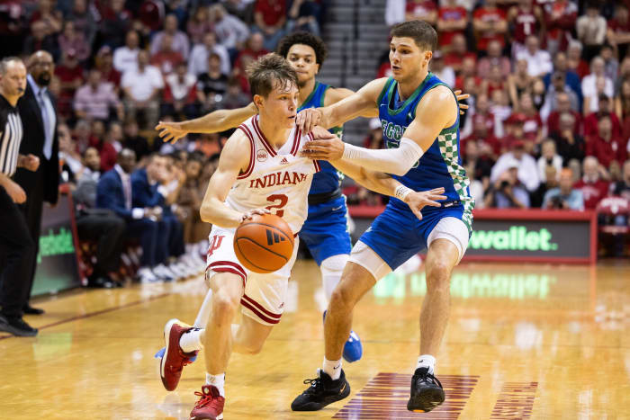 Indiana Hoosiers guard Gabe Cupps (2) dribbles against Florida Gulf Coast Eagles guard Chase Johnston (55) in the second half at Simon Skjodt Assembly Hall.